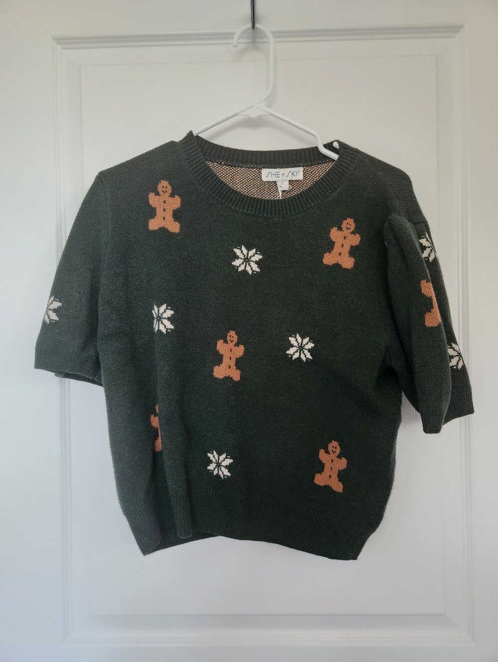 Green Holiday Sweater with Gingerbread and Snowflake Motif